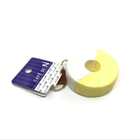 Cafe de N Chocolate Fondue Pineapple squishy in original packaging, shaped like a realistic pineapple dipped in either dark or white chocolate; features glossy drizzle detail, textured surface, and comes with a tag for authenticity.