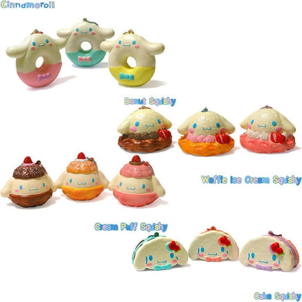 "Cinnamoroll-themed squishies including a donut, cake slice, cream puff, and waffle, each designed with pastel colors and cute character details. Packaged in original Sanrio 2017 packaging, showcasing the soft, textured surface and collectible charm."