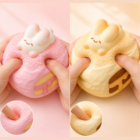 Bunny Cream Puff Squishy featuring a realistic textured cream puff topped with an adorable bunny, available in Peach Cream and Yellow Cream, slow-rising kawaii stress relief toy.