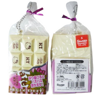 Hello Kitty Paki Paki cracking bar squishy, vintage 1976–2009 design, shaped like a chocolate candy bar, in original licensed packaging.