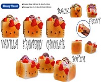 Sanrio Hello Kitty Sweets Cafe Honey Toast squishy bread, vintage-style and realistically textured, shaped like a thick toast square with golden brown detailing. Features Hello Kitty’s face on top, wrapped in original packaging with a red authenticity sticker.