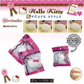 Super rare Hello Kitty Sweets Cafe marshmallow squishy with soft rounded design, original packaging, pink ball chain, and red Sanrio authenticity sticker; vintage 1976–2010 item with possible age-related cracks or imperfections.