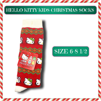 Hello Kitty kids knee-high Christmas socks featuring festive red, green, and white holiday colors with a cute Sanrio design. Cozy, stretchy, and sized for kids 6–8.5.