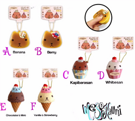 Kapibarasan Cafe Series Squishy Collection featuring licensed ice cream cones, cupcakes, and pancakes with gold ball chain and original tags in sealed packaging."