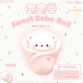 Nunu Sweet Babe Roll Squishy featuring a white baby character wrapped in a soft pink cake roll with a heart detail, slow-rising scented collectible in a clear display box.