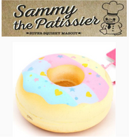 Sammy the Patissier Colorful Donuts squishy, released May 2017; super soft, slow-rising squishy in vibrant pastel and bright color variations, each donut measuring 3.5 by 3.5 inches; shown in original packaging with tag included.