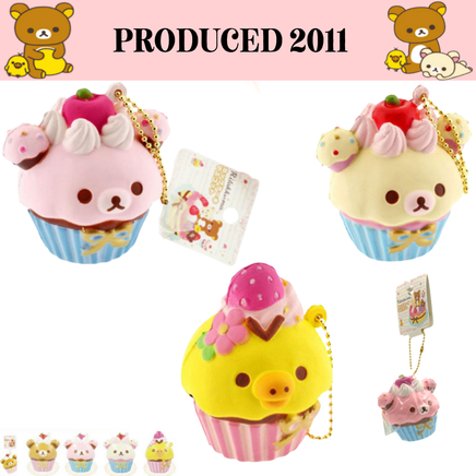 Rilakkuma Strawberry Cupcake Squishy from 2011 in original packaging with tags and gold ball chain, rare collectible perfect as bag charm, keychain, or accessory.