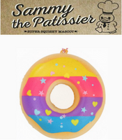 Sammy the Patissier Colorful Donuts squishy, released May 2017; super soft, slow-rising squishy in vibrant pastel and bright color variations, each donut measuring 3.5 by 3.5 inches; shown in original packaging with tag included.