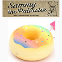 Sammy the Patissier Colorful Donuts squishy, released May 2017; super soft, slow-rising squishy in vibrant pastel and bright color variations, each donut measuring 3.5 by 3.5 inches; shown in original packaging with tag included.