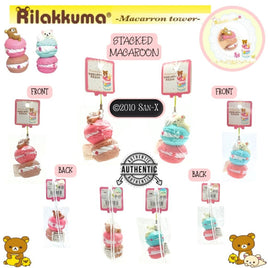 2010 stacked macaron squishy featuring San-X characters Rilakkuma and Korilakkuma with pastel macaron layers, original tags, and packaging; soft texture, vintage conditio
