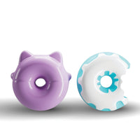 Two donut-shaped toys, one purple and one with a blue and white design, on a white background.
