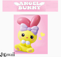 I-Bloom Angel Bunny squishy, scented and slow-rising, shown in four pastel color variations. Features soft bunny shape with angel wings, blushing cheeks, and cute expression. Made of PU foam and packaged in original 2017 licensed packaging for collectors.