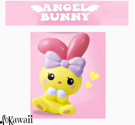 I-Bloom Angel Bunny squishy, scented and slow-rising, shown in four pastel color variations. Features soft bunny shape with angel wings, blushing cheeks, and cute expression. Made of PU foam and packaged in original 2017 licensed packaging for collectors.