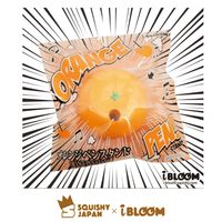 Orange Pen Holder Squishy in original packaging, licensed kawaii desk accessory shaped like an orange, holds standard pen or pencil, soft and slow-rising