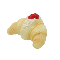 SweetBunS Les Roses Croissant Bun squishy featuring realistic flaky pastry texture, rose-inspired design, slow-rising scented foam in Rose Savona Milk Puff Pastry or Pink Rose Wheat Flaky Pastry.