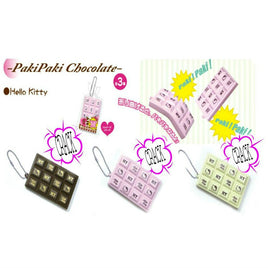 Hello Kitty Paki Paki cracking bar squishy, vintage 1976–2009 design, shaped like a chocolate candy bar, in original licensed packaging.