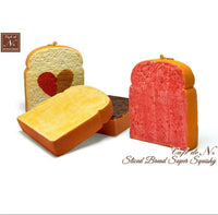 Café de N Bakery Sliced Bread squishy featuring a realistic, lightly toasted surface and soft, slow-rising texture. Made from PU foam and packaged in original Café de N packaging with tag. Released in May 2017.

