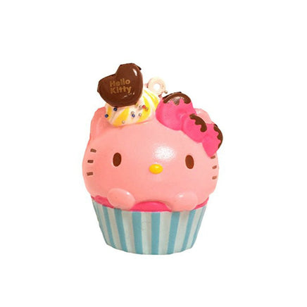 Kitty Cupcake Squishy shown in four unique designs, each featuring a cat-themed cupcake with colorful frosting and detailing. Made from soft, slow-rising material, each comes with an attached keychain and is packaged in original licensed packaging with tags.